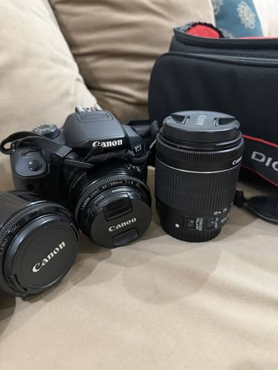 Canon camera with 3 lenses