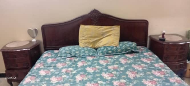 king size bed with two mattress ,two side tables and dressing table