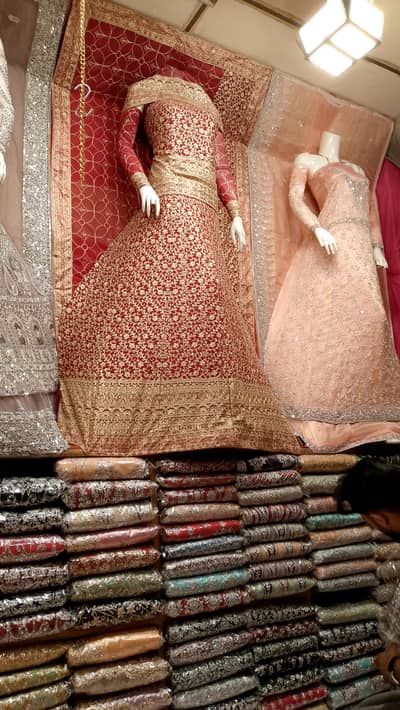 Mehroon Bridal Lehenga choli with heavy Golden embroidery,l