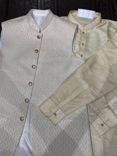 Harron designers new suit and wasicot