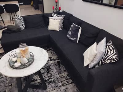 L shape black sofa