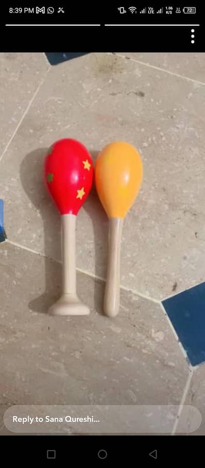 Two wooden maracas pair