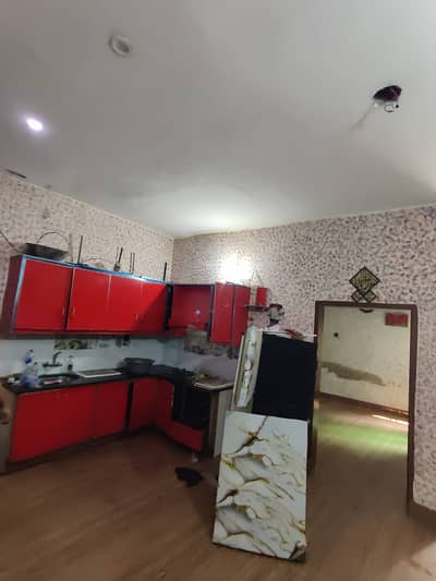 Lower portion with three bedrooms and three washrooms available for girls or for family in bhatti colony model town link road