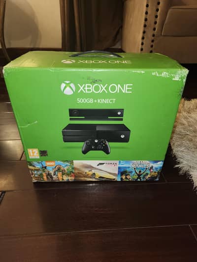Xbox One with 2 Controllers and 2 Games