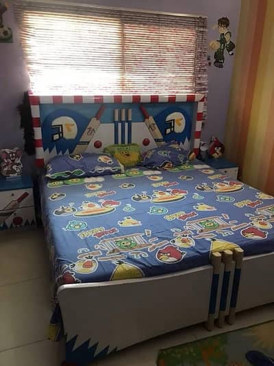 Kids bed available with side tables and a study table