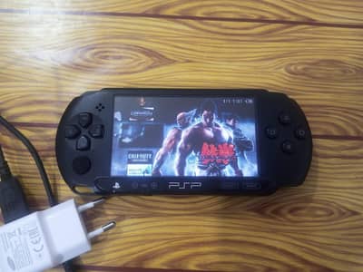 Sony PSP E1000 Jailbroken with 8GB card, charger available for sale!