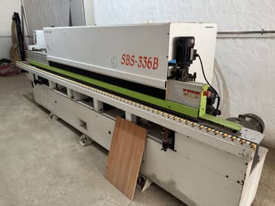 Wooden edging machine and cutter