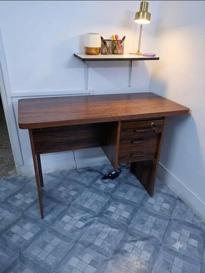 A good slightly used table is available for sale