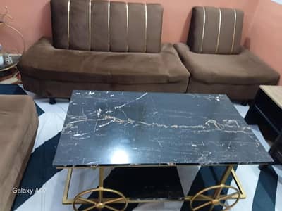 fomic brown leather valvet sofa set with table. .