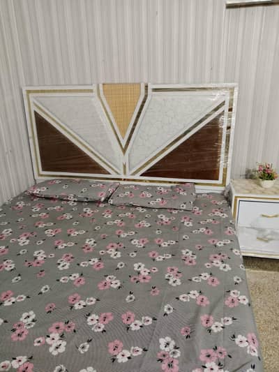 double bed with 2 side table