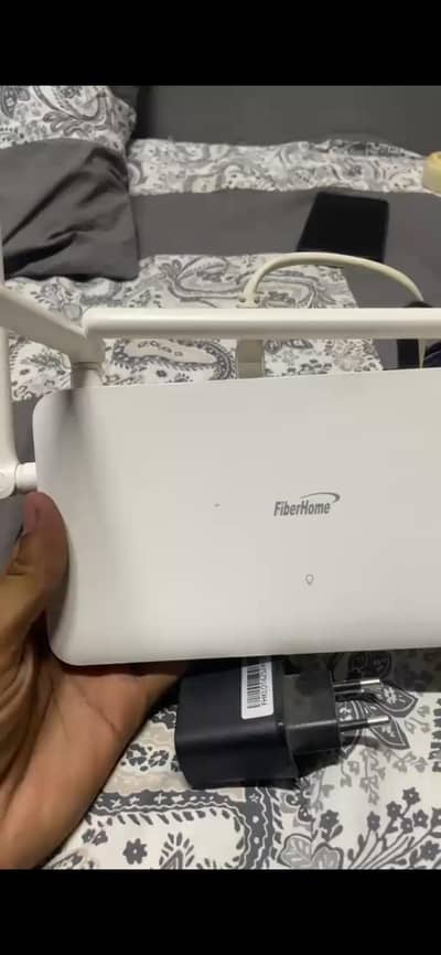 fiberhome router 4 ports with huawei stormfiber box