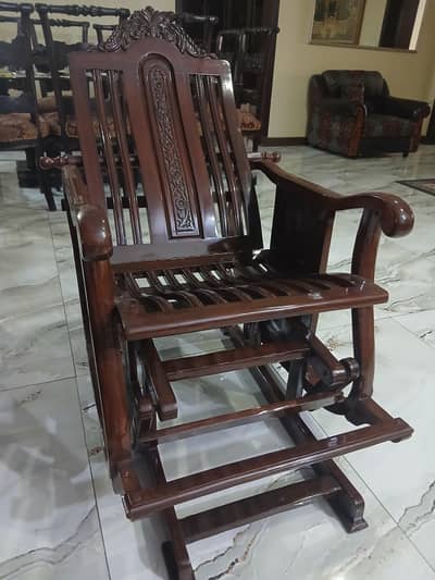 sesham wood rocking chair with high glass polish