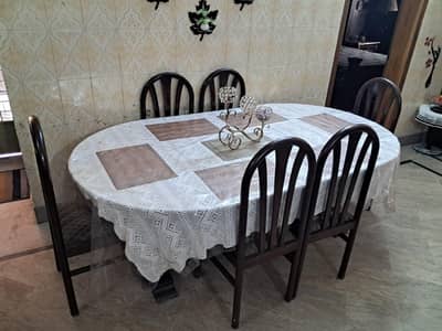 Oval Shape Dinning Table with 6 Chairs.