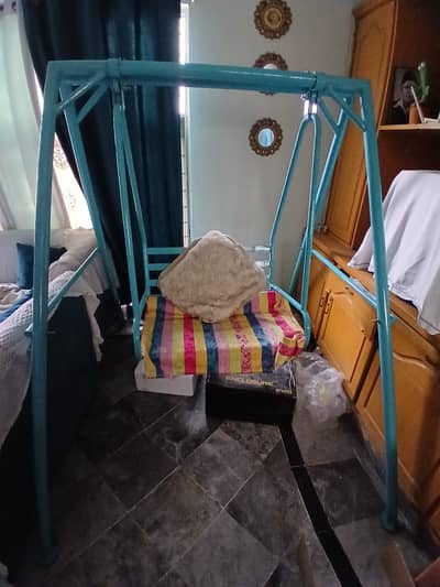 Light blue iron swing for