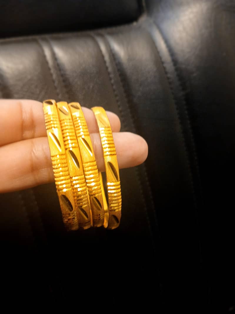 Gold plated bangles (4 bangles) 1