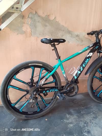 LAZER STAR ALLOY RIM BICYCLE WITH 7 GEARS AND DISK BRAKES FOR SELL 25