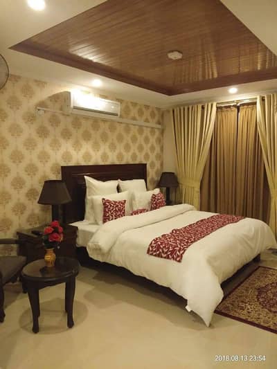 Par Day and short Time One and Two BeD Room appaertment Available Bahria Town Phase 4 and 6 Empire Heights 2 family apartment any time available