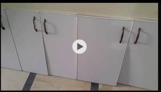 Kitchen cabinet with hinges