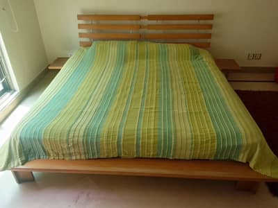 King size bed from Habitt with a spring mattress