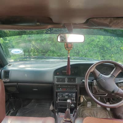 Toyota Corolla 1988 1600cc Manual | Petrol + CNG | White | Taxila