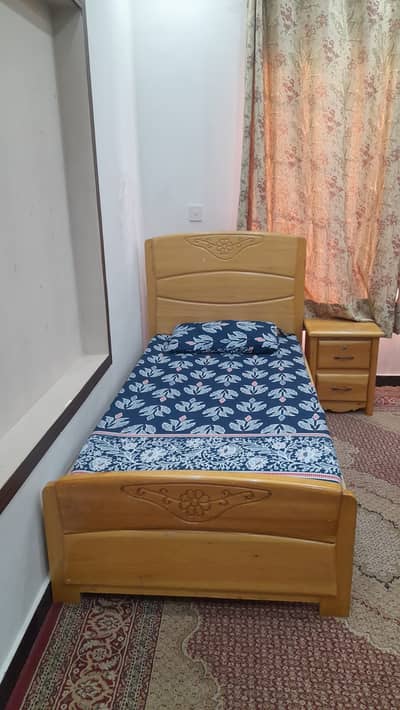 Single beds, side tables and dressing for sale