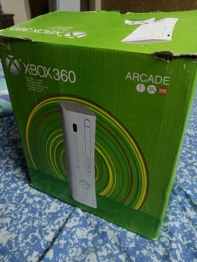 Xbox console with wir controller and wireless controller