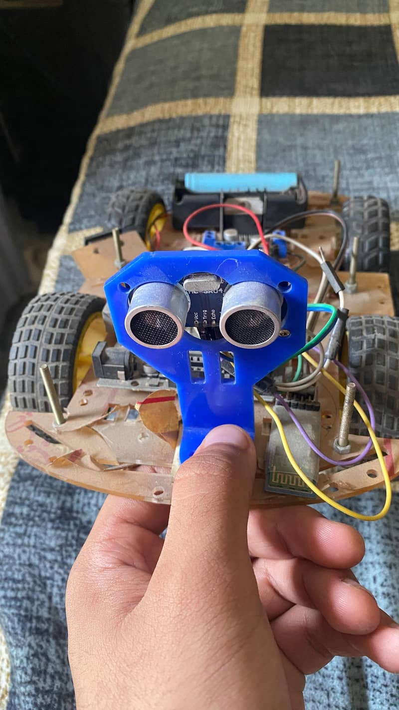 Bluetooth and obstacles avoiding car 1