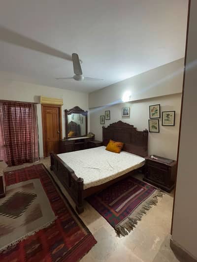 Furnish room available in F10 Al mustafa tower for lady