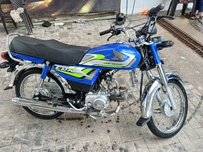 Honda 70cc almost new with all new condition