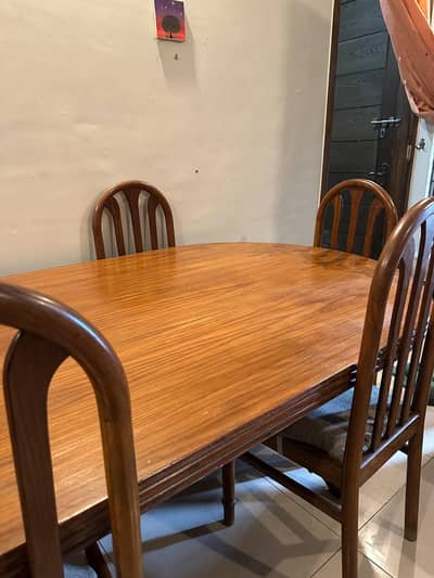 wooden dining table with 6 chairs