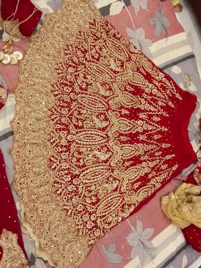 Bridal lahnga on chiffon fabric tilla nakshi dabki work