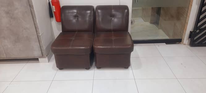 2 Premium Brown Leather Lounge Chairs – Good Condition