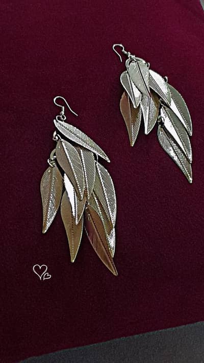 Dripping leaves earrings  holds moments 