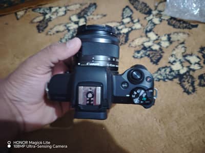 Canon Eos m50 with 15-45mm is stm kit lens and accessories. urgent.
