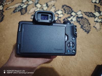 Canon Eos m50 with 15-45mm is stm kit lens and accessories. urgent.