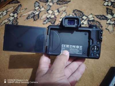 Canon Eos m50 with 15-45mm is stm kit lens and accessories. urgent.