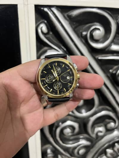 Tissot men watch gold and black excellent condition