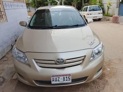 Toyota Corolla GLI 2011 golden color neat and clean car