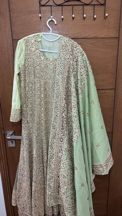 Mint Green Heavy Embroidered Bridal Lehenga Set – Worn Once