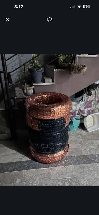 Selling 5 Tyres R14 ( New Cultus )