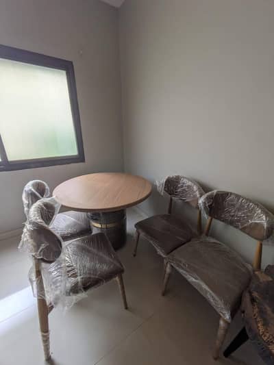 luxury dining table with PVC top with four chairs