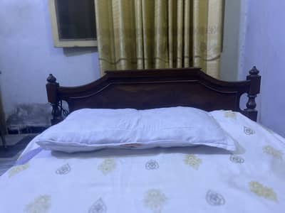 2 single wooden beds for sale