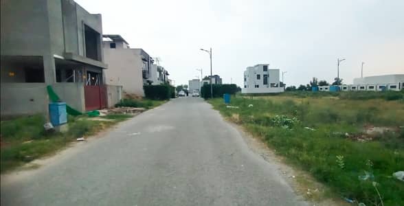 With All Dues Clear Plot No-3214 Block B - 5 Marla Plot On Top Location of Phase 9 Town DHA Lahore For Urgent Sale