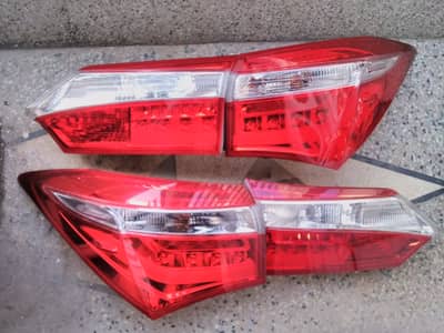 TOYOTA COROLLA GLI BACK PAIR GENUINE HEADLIGHTS