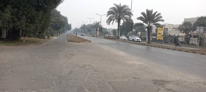 On 100 Ft Rd Pair of Kanal Plot No-348 And 349 Block R - Total 2 Kanal Plot On Top Location of Phase 7 DHA Lahore For Urgent Sale