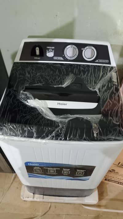 brand new Haier 12kg top loader washing machine box packed price 25000