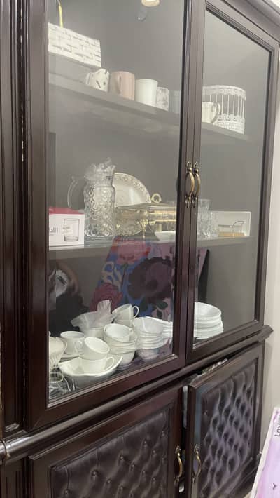 Dark brown cabinet + shelf