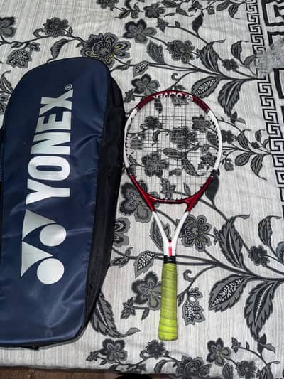 pro tennis racket branded strings with new kit bag and one ball