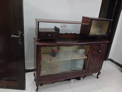 wooden showcase to keep crockery and other kitchen items