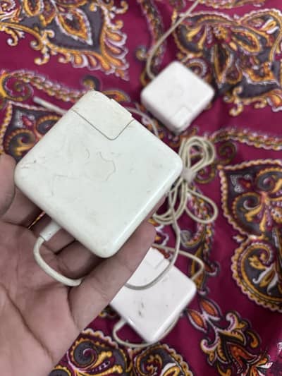 MACBOOK original chargers available for sale.